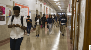high school students in a hallway