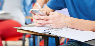 a student using a cellphone in class